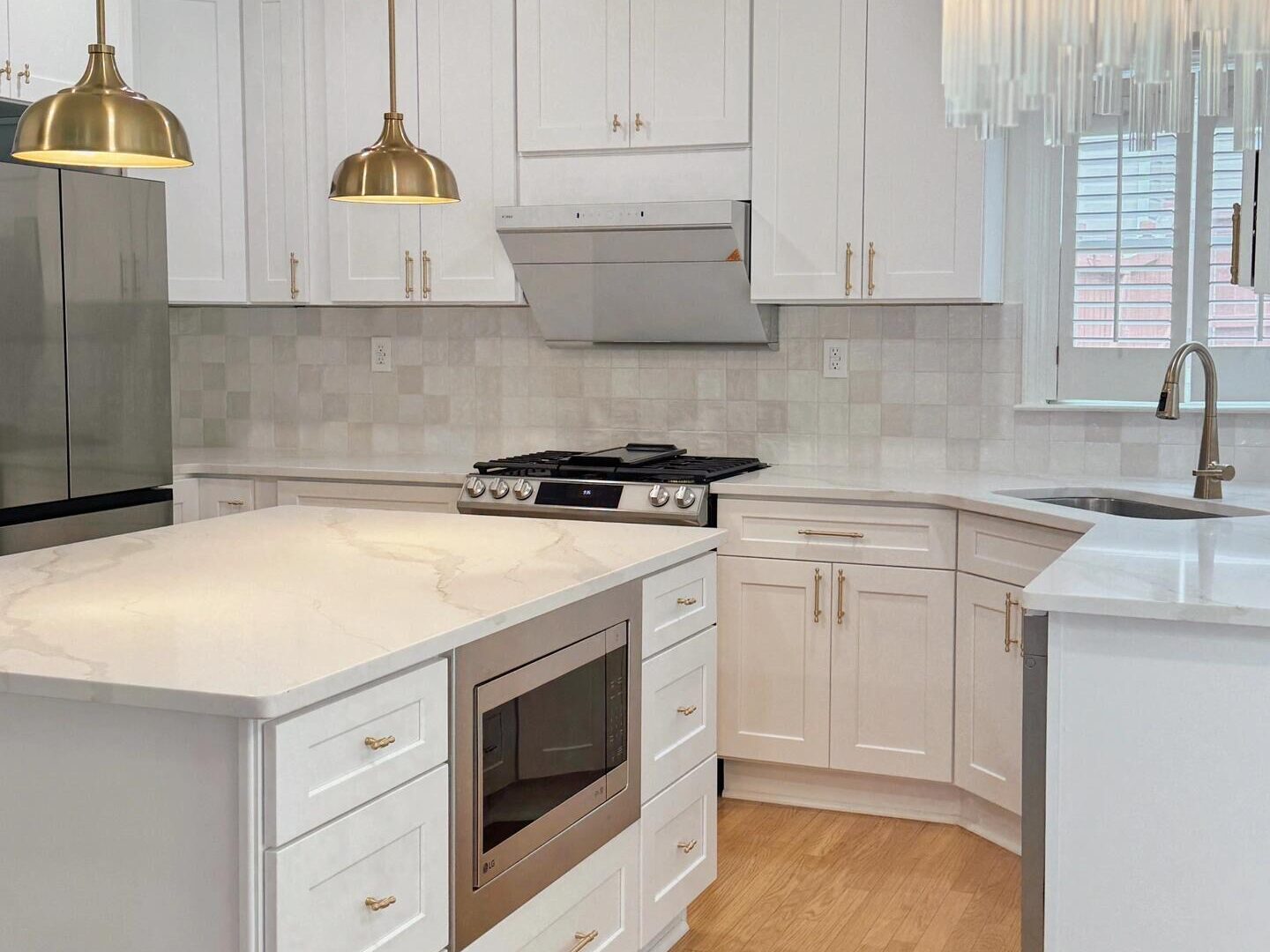 White Shaker cabinets with Gold hardware Kitchen