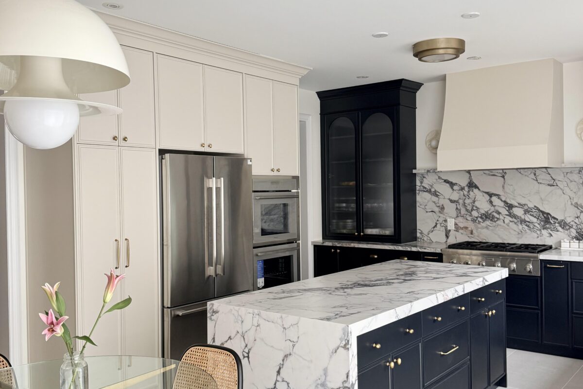 Black Cabinets With Taj Mahal Countertop
