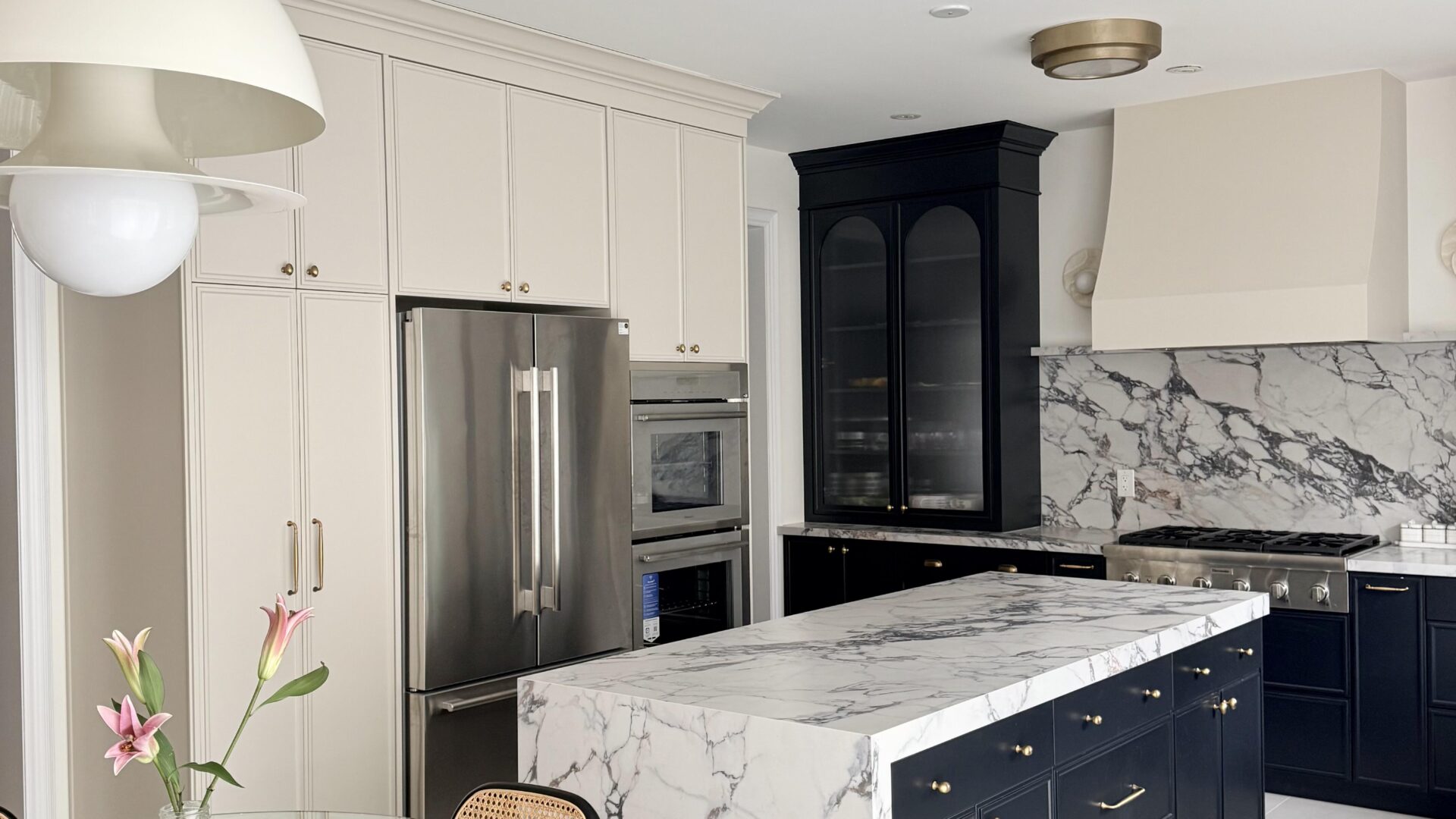 Black Cabinets With Taj Mahal Countertop