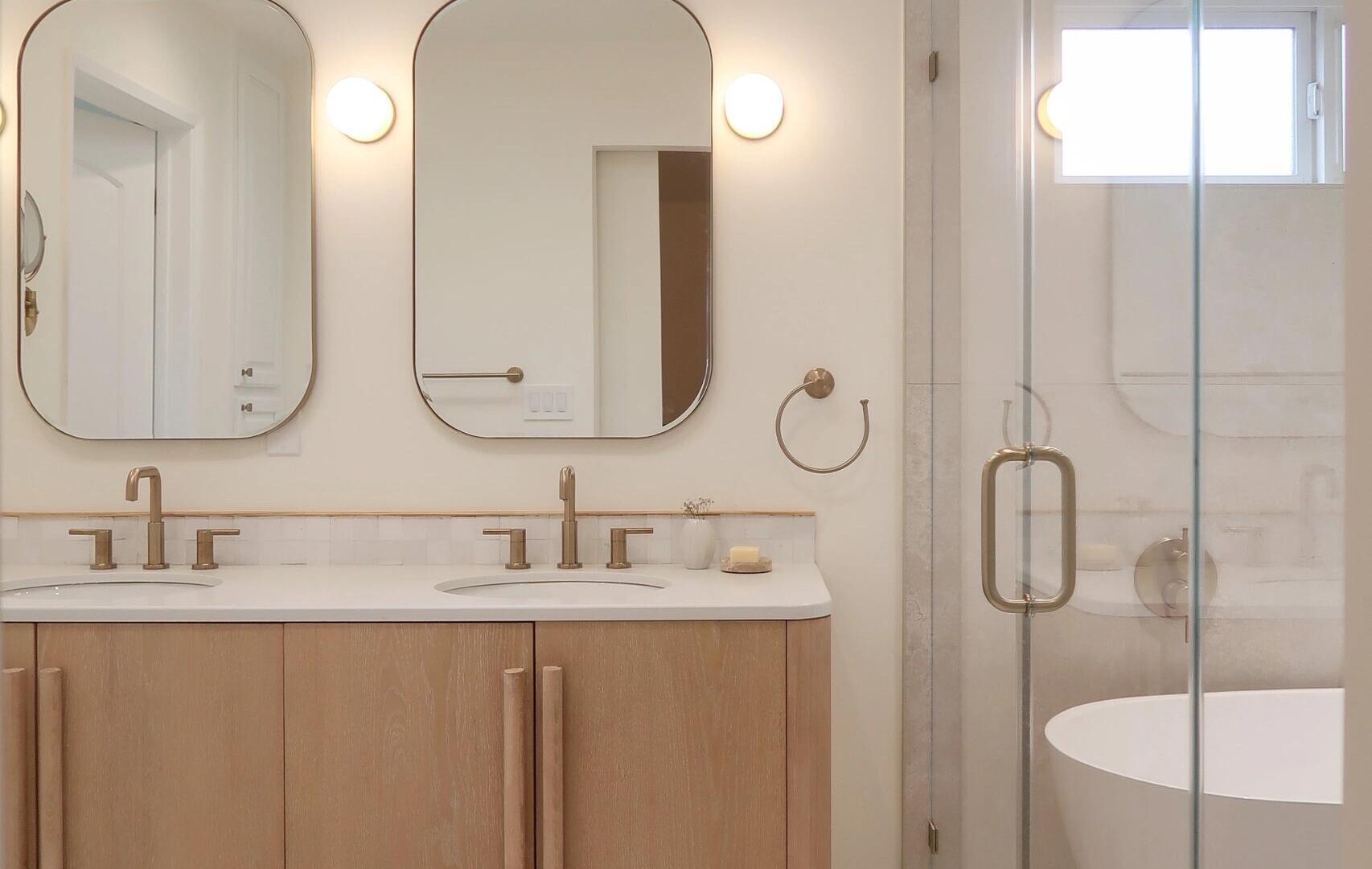 A Calm Retreat: Wood Double Vanity & Freestanding Tub