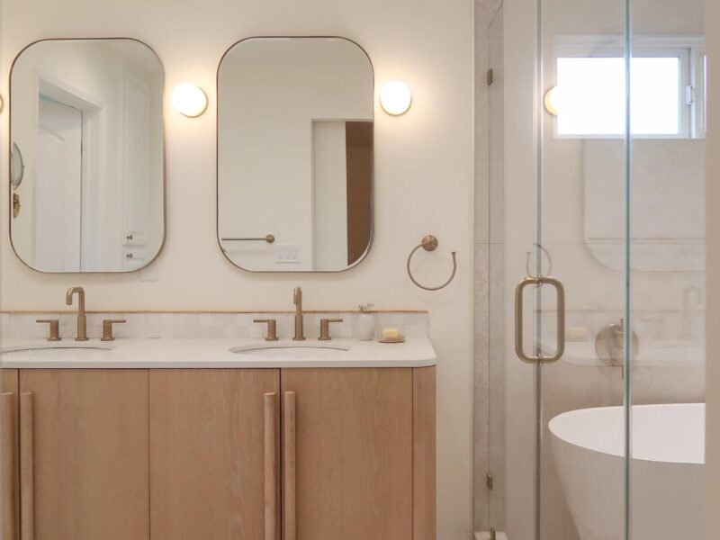 A Calm Retreat: Wood Double Vanity & Freestanding Tub