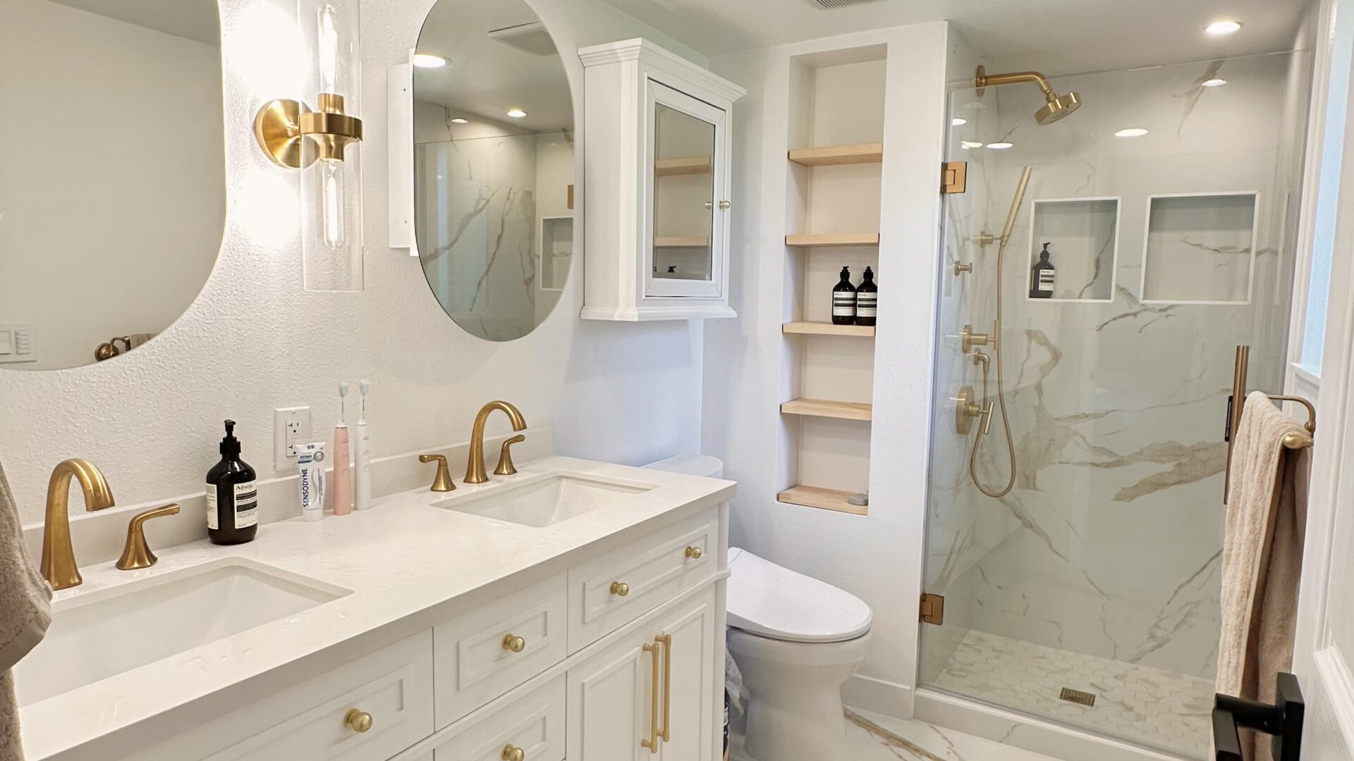 Timeless Grace: White Double Vanity & Gold Accents