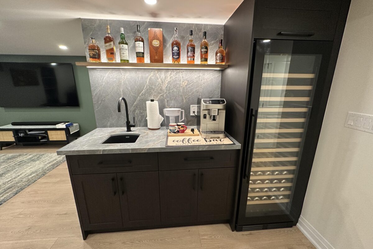 Evening Elegance: Black Cabinet Basement Wet Bar