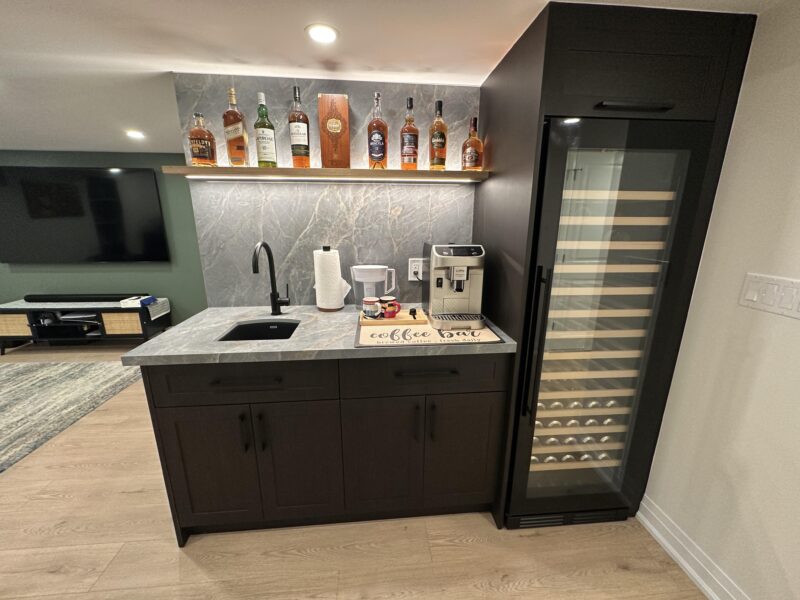 Evening Elegance: Black Cabinet Basement Wet Bar