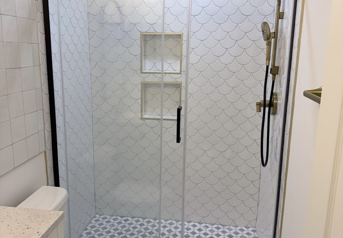 Timeless Serenity: Bathroom with a Sliding Glass Shower Door