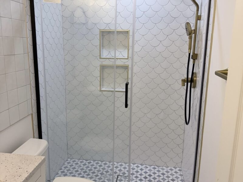 Timeless Serenity: Bathroom with a Sliding Glass Shower Door